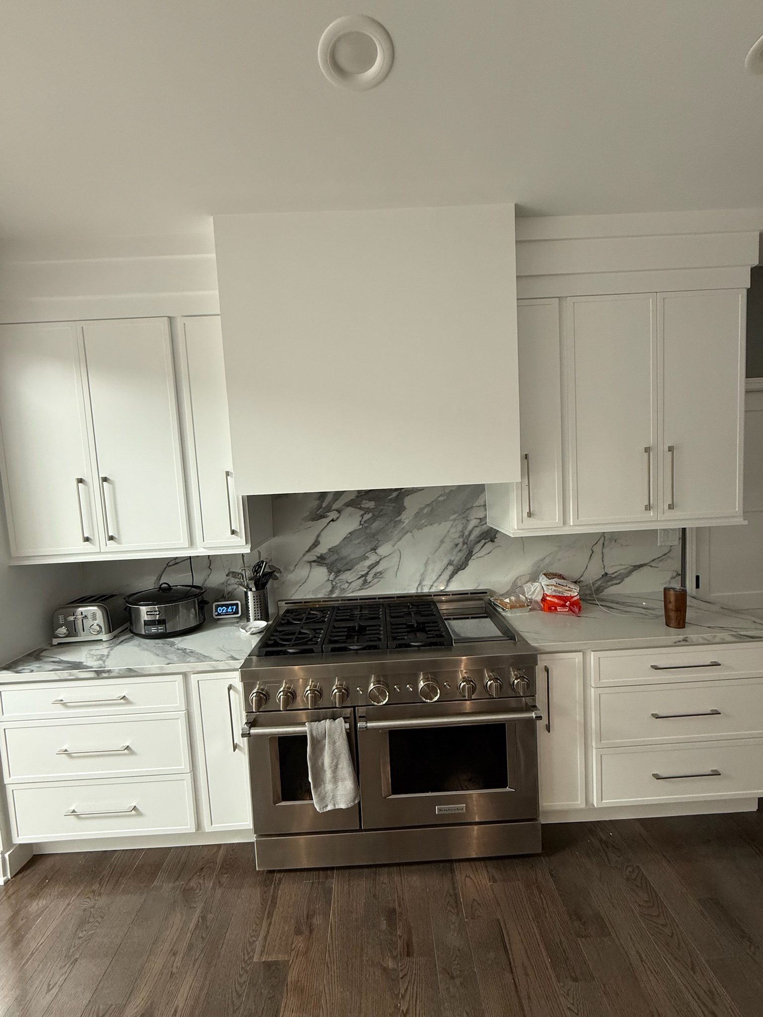 Custom painted range hood in a Naperville kitchen remodel