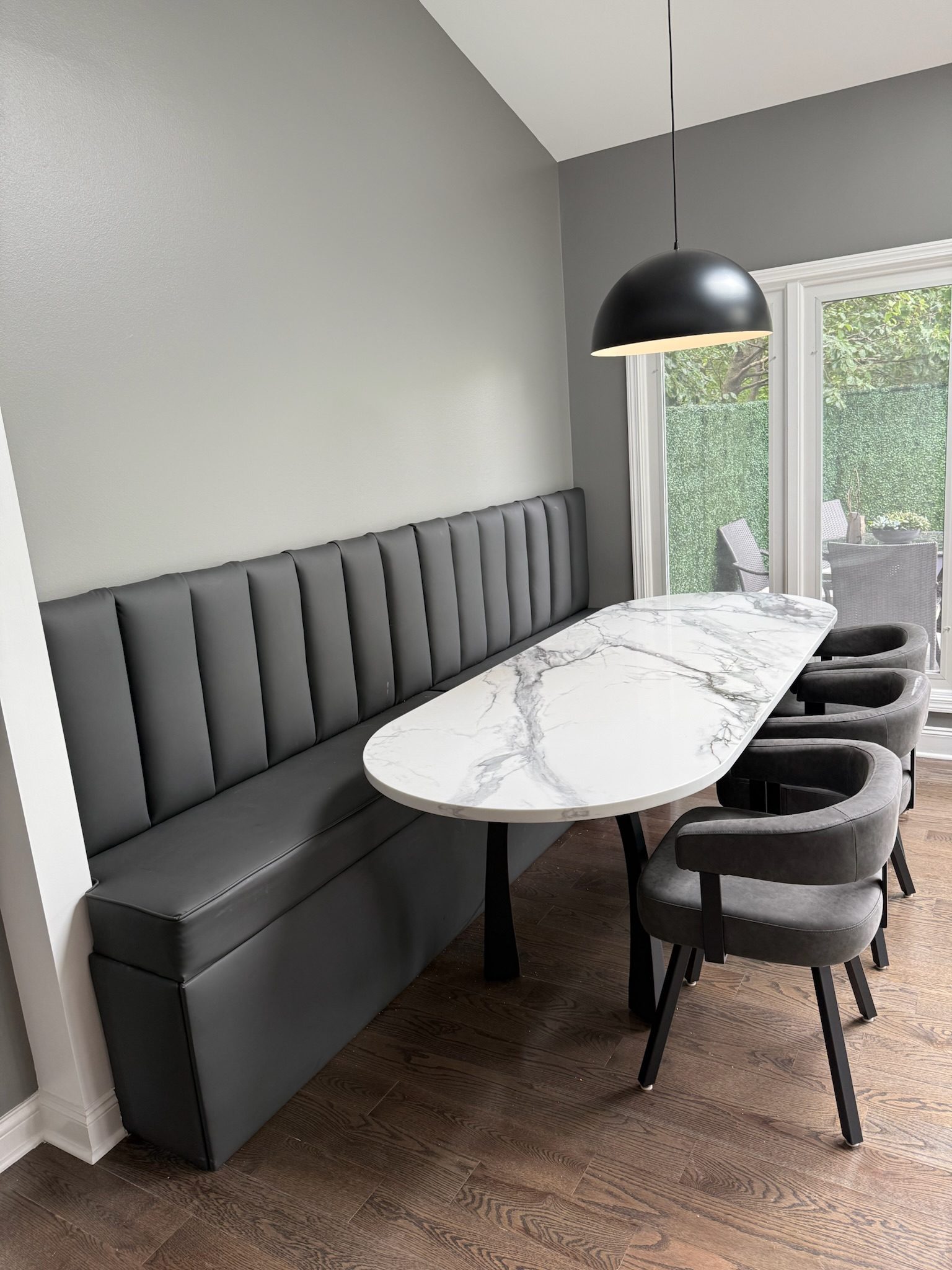 Upholstered banquette with quartz table in a Naperville kitchen